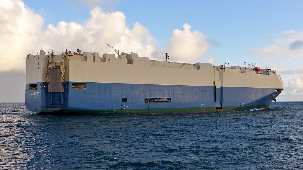 Roll on roll off car shipping vessel on the water.