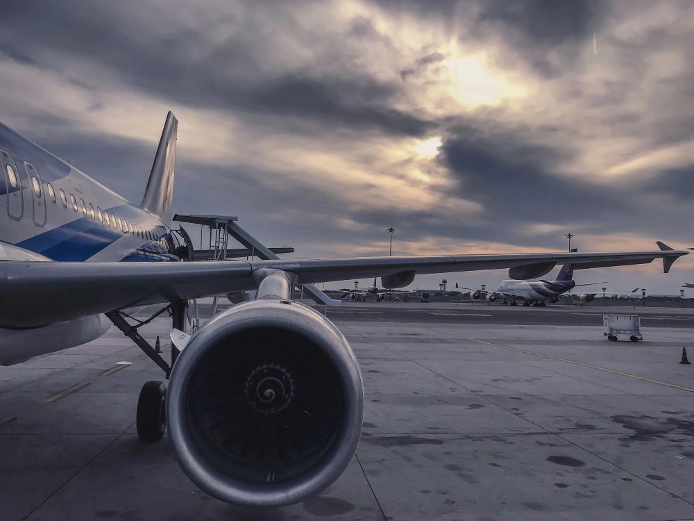 Close up of plane propeller on an air strip. How does air freight work?