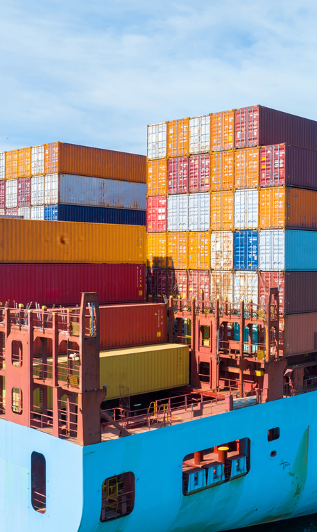 Shipping containers stacked high on a cargo boat. 