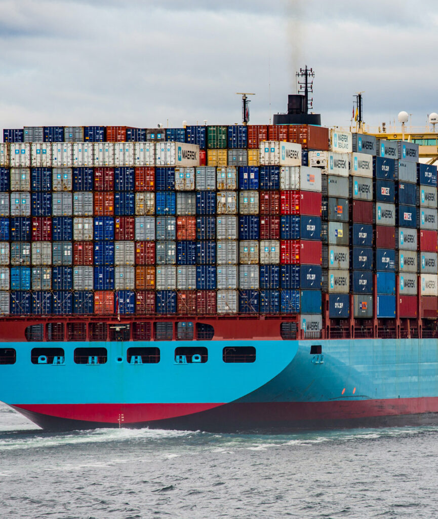 Logistics services - Cargo ship carrying shipping containers 